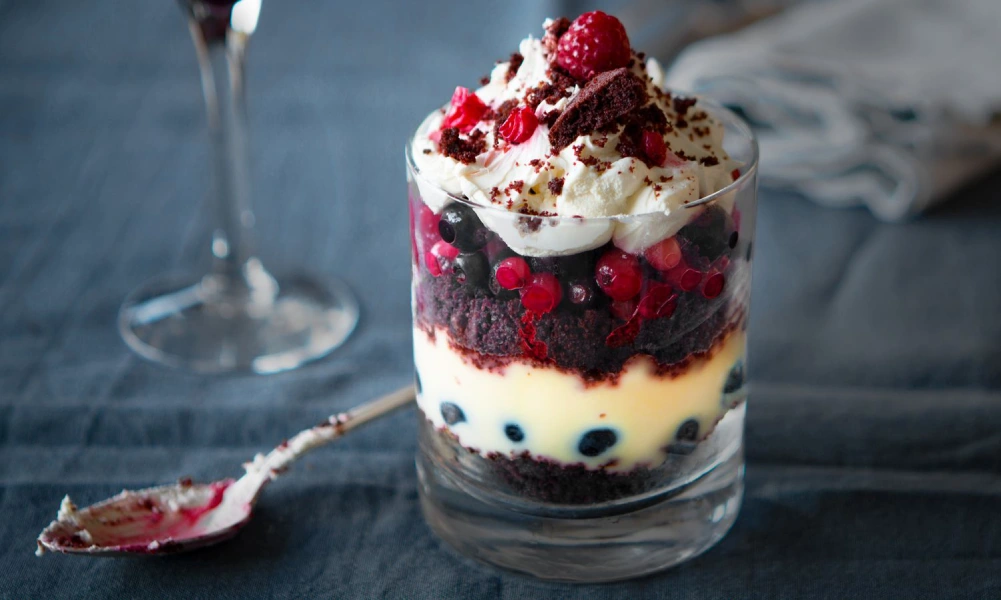 Putting Together Your Cup Of Crumbl Berry Trifle Cake