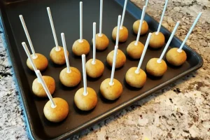 Push The Stick Halfway Into Each Cake Ball